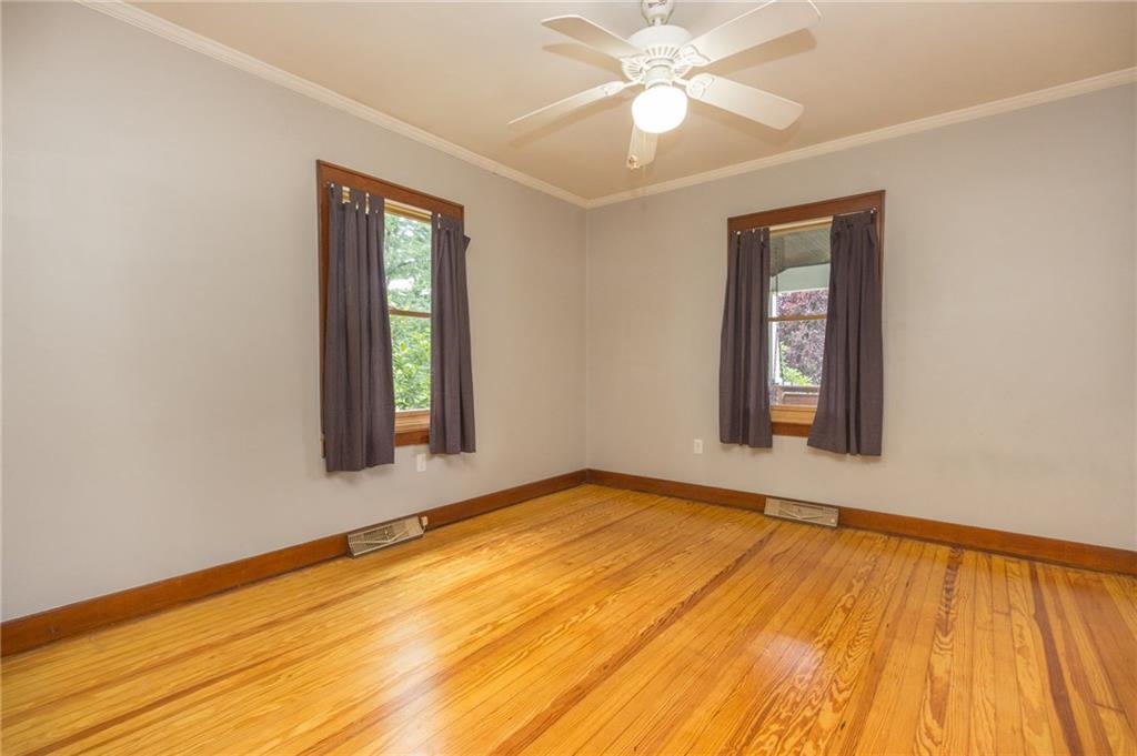 604 Golf Course Road Aliquippa, PA 15001 - Photo 18 of 23 First floor second bedroom with gleaming floors.