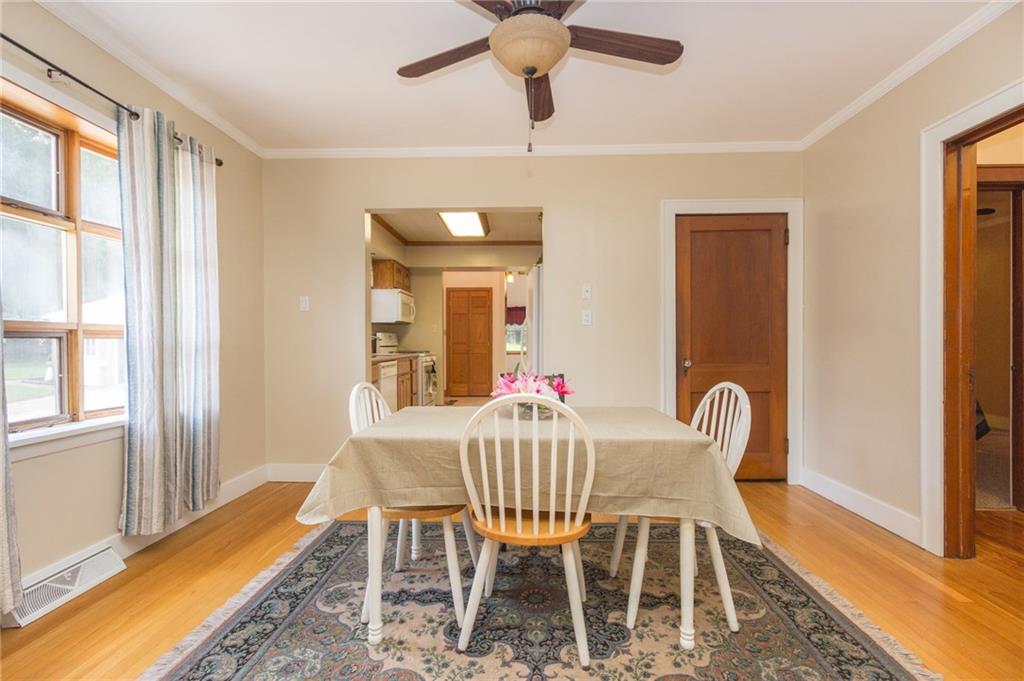 Light, bright dining room with fan/light