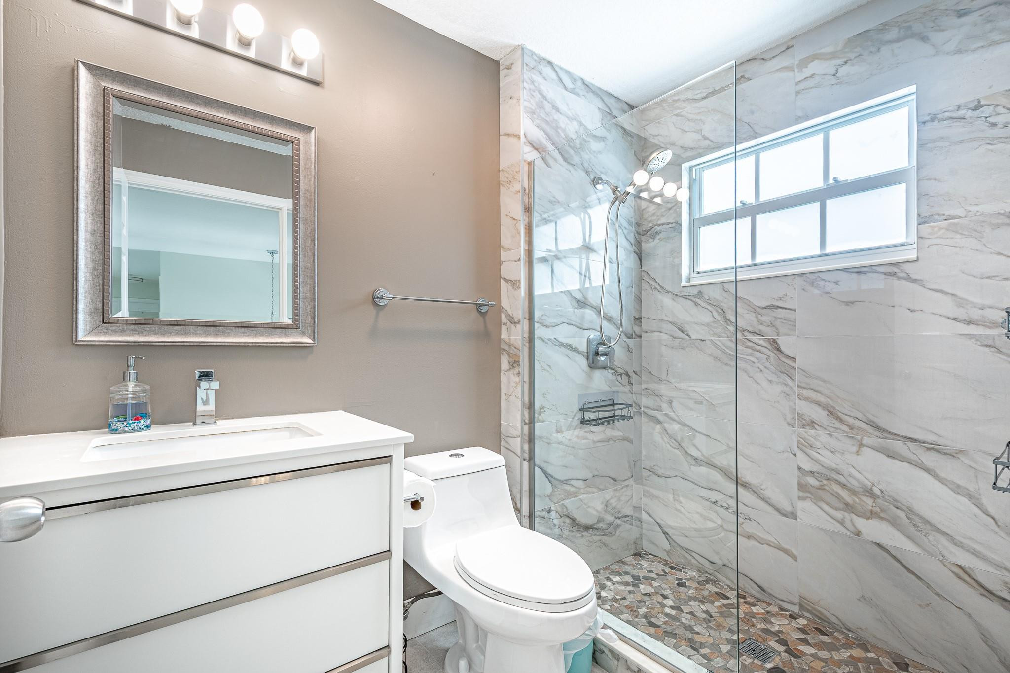 10631 Bexley Boulevard Boca Raton, FL 33428 - Photo 21 of 47 Bathroom downstairs