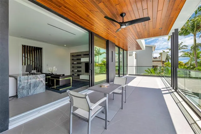 a kitchen with stainless steel appliances a stove a sink and cabinets