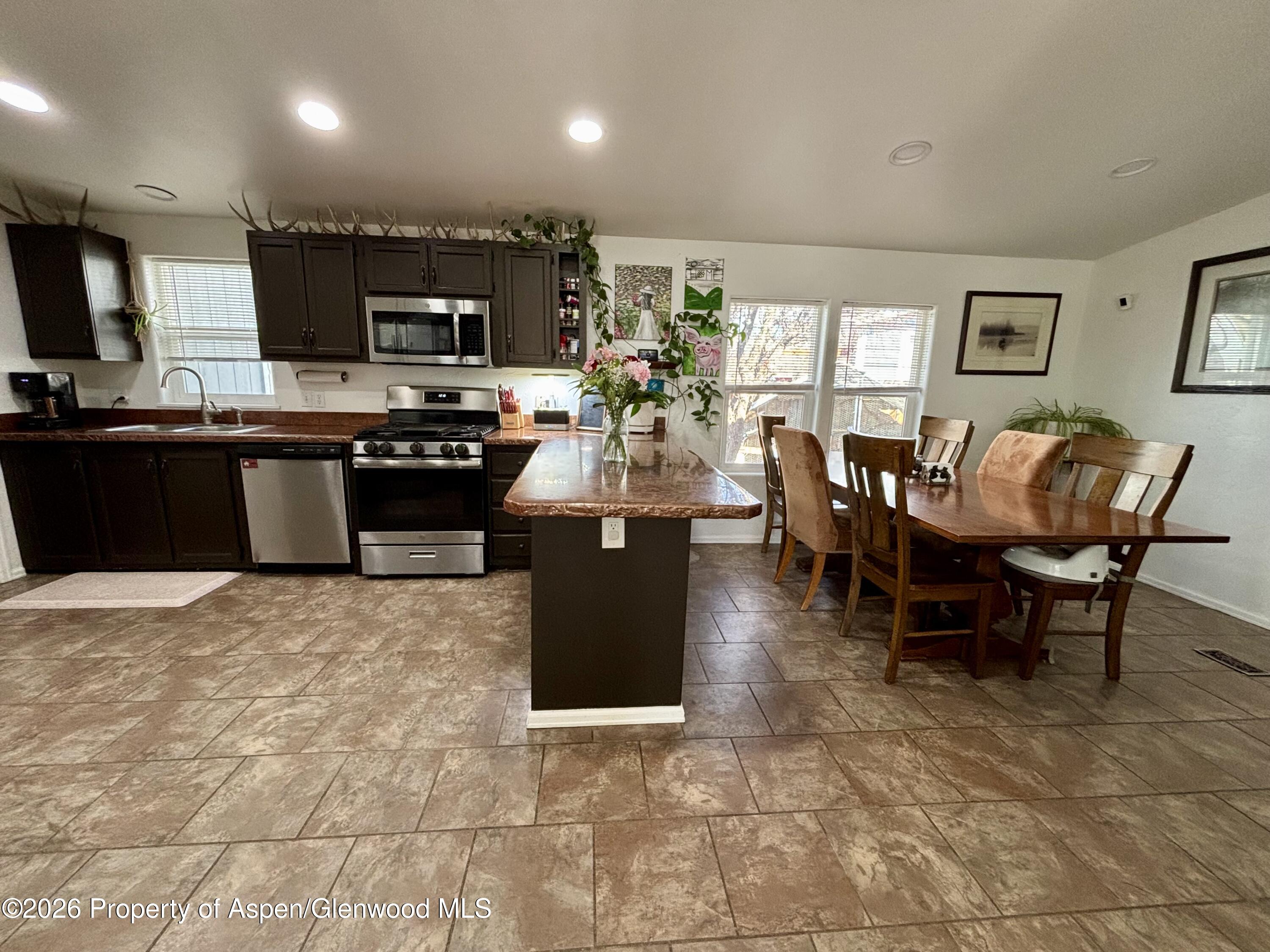 106 Cedar Circle Parachute, CO 81635 - Photo 7 of 35 a view of a dining room with furniture
