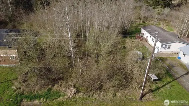 a view of residential house with parking space