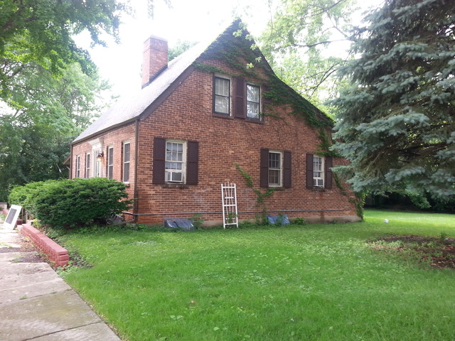 2156 Oak Road Homewood, IL 60430 - Photo 3 of 7 a brick house with a large tree