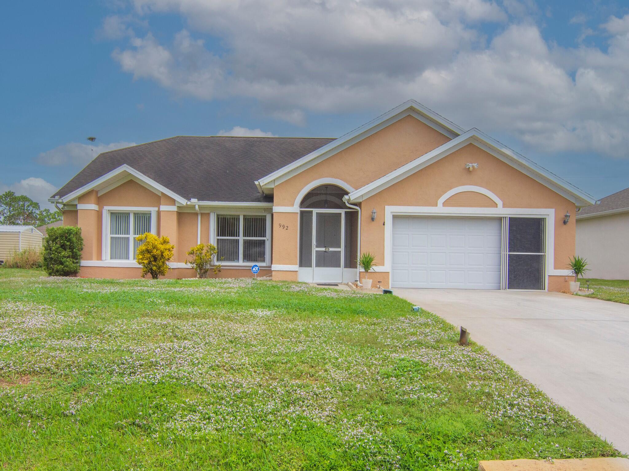 front view of a house and a yard