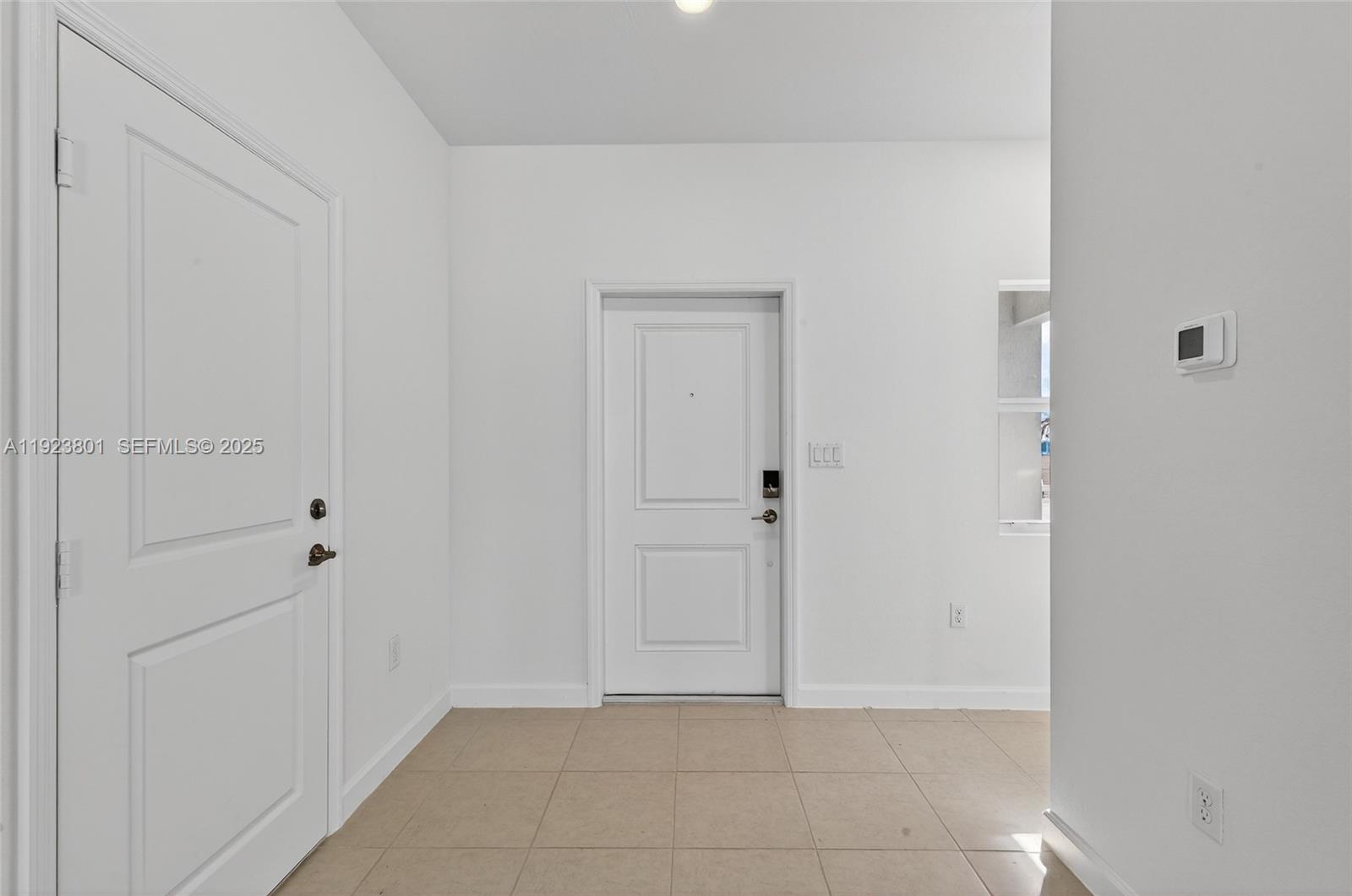 19431 Southwest 340th Street Homestead, FL 33034 - Photo 11 of 48 a view of an empty room