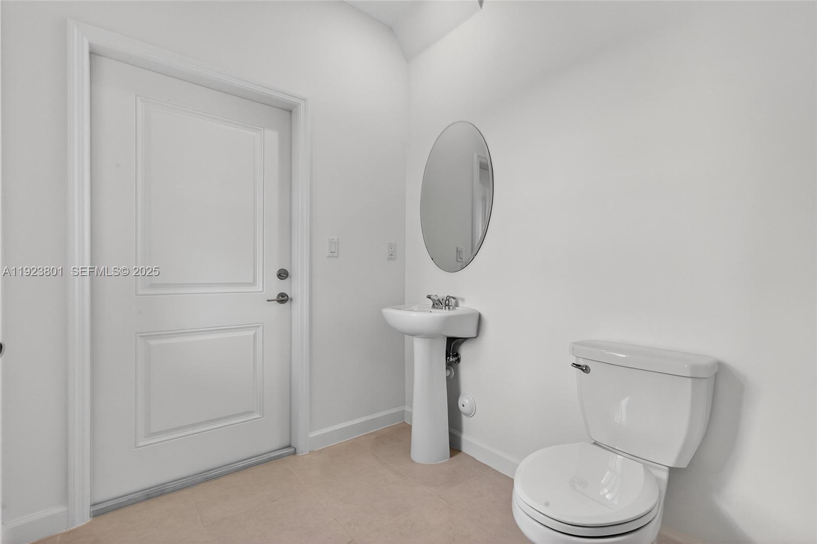 19431 Southwest 340th Street Homestead, FL 33034 - Photo 14 of 48 a white toilet sitting next to a shower