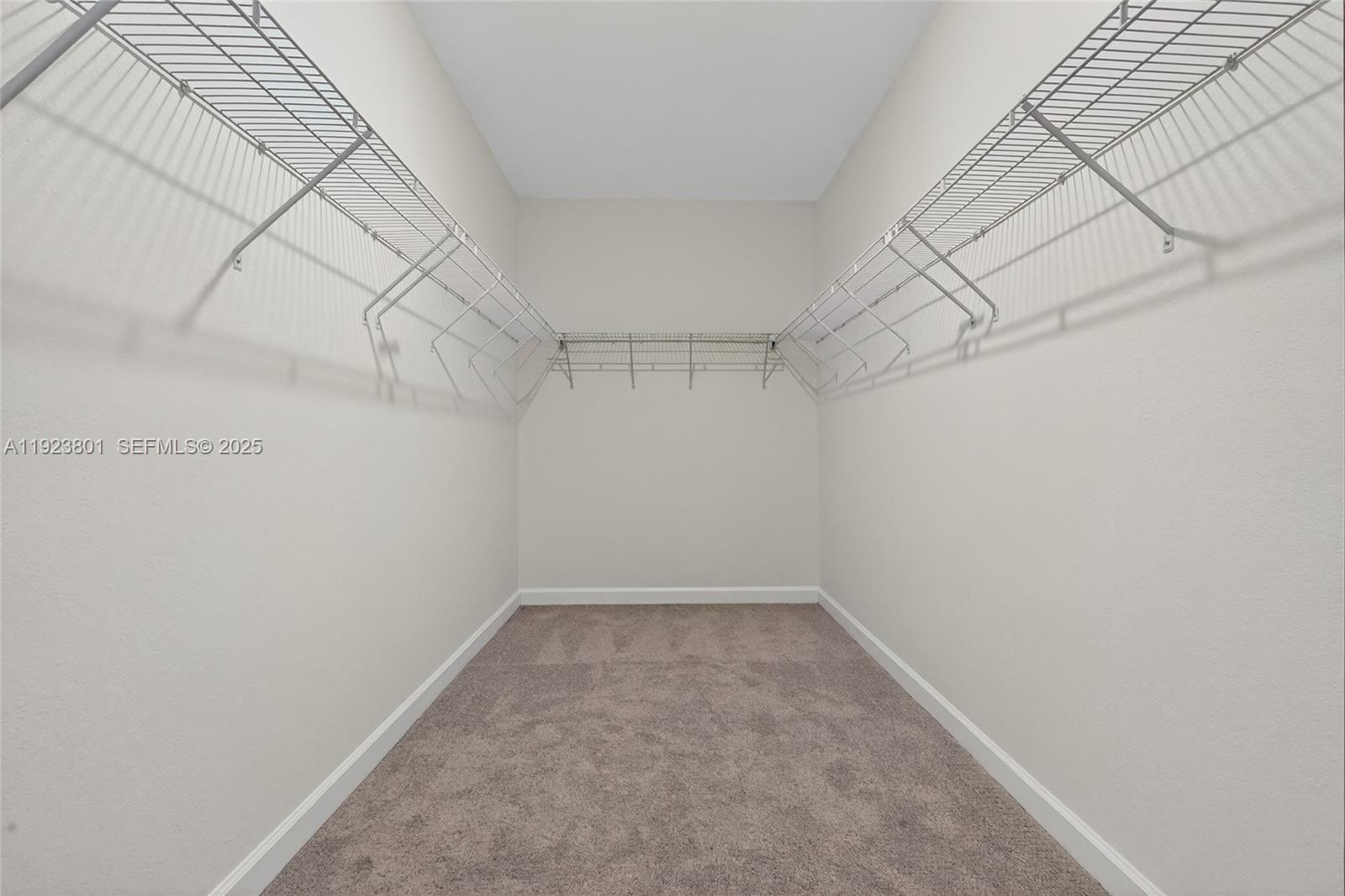 19431 Southwest 340th Street Homestead, FL 33034 - Photo 21 of 48 a view of a room with racks on the wall