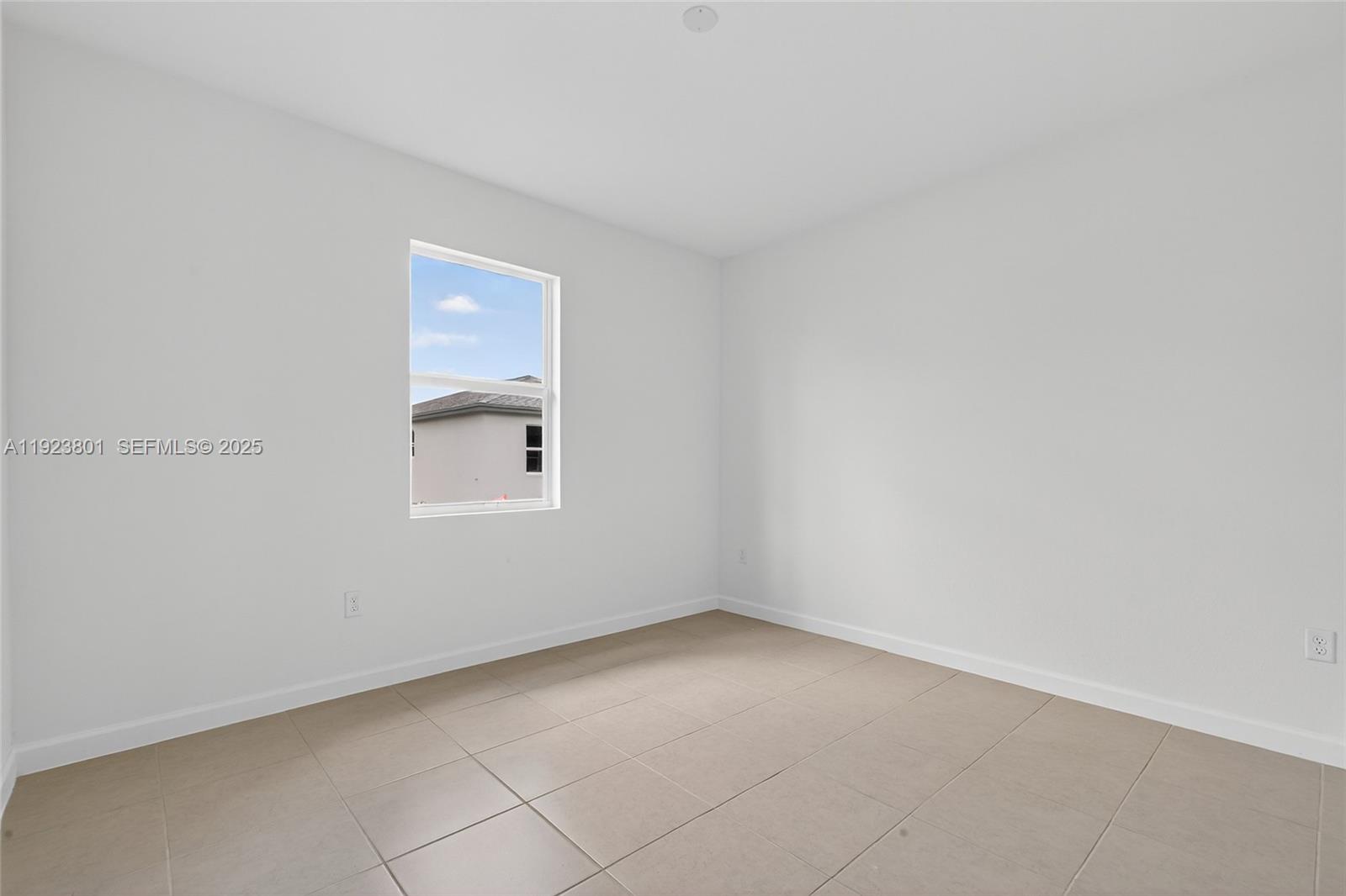 19431 Southwest 340th Street Homestead, FL 33034 - Photo 30 of 48 a view of an empty room