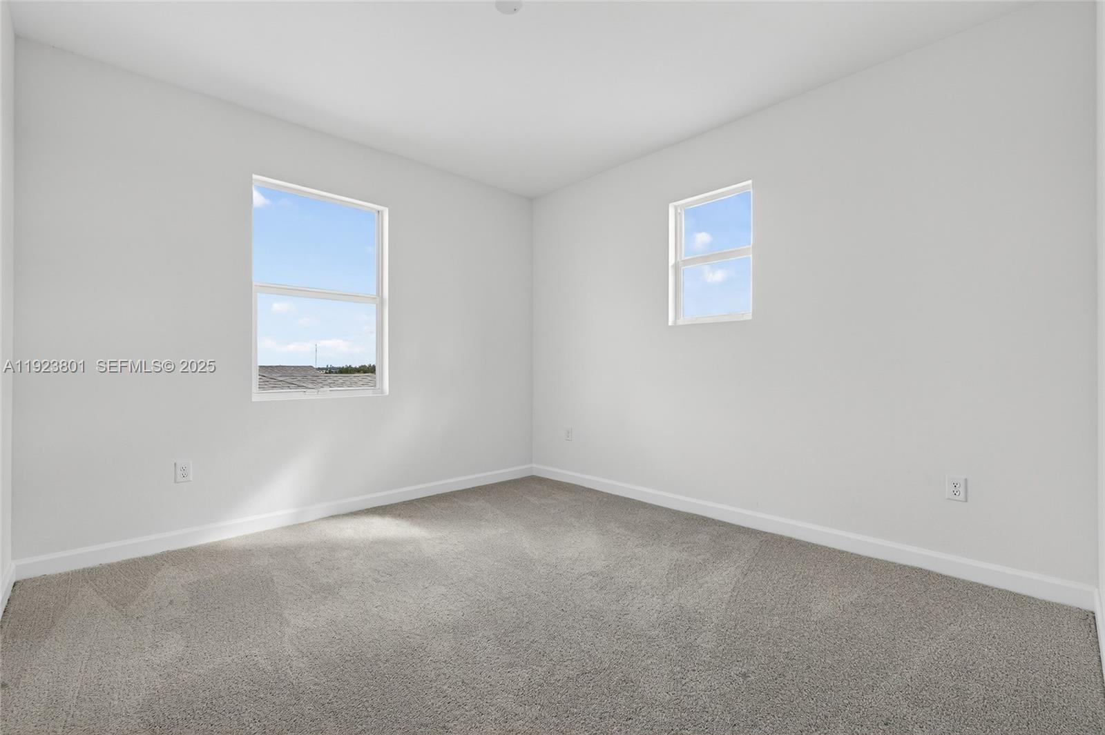 19431 Southwest 340th Street Homestead, FL 33034 - Photo 34 of 48 an empty room with a window