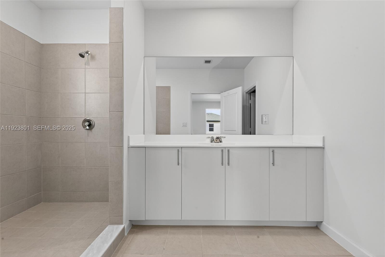 19431 Southwest 340th Street Homestead, FL 33034 - Photo 36 of 48 a bathroom with a shower