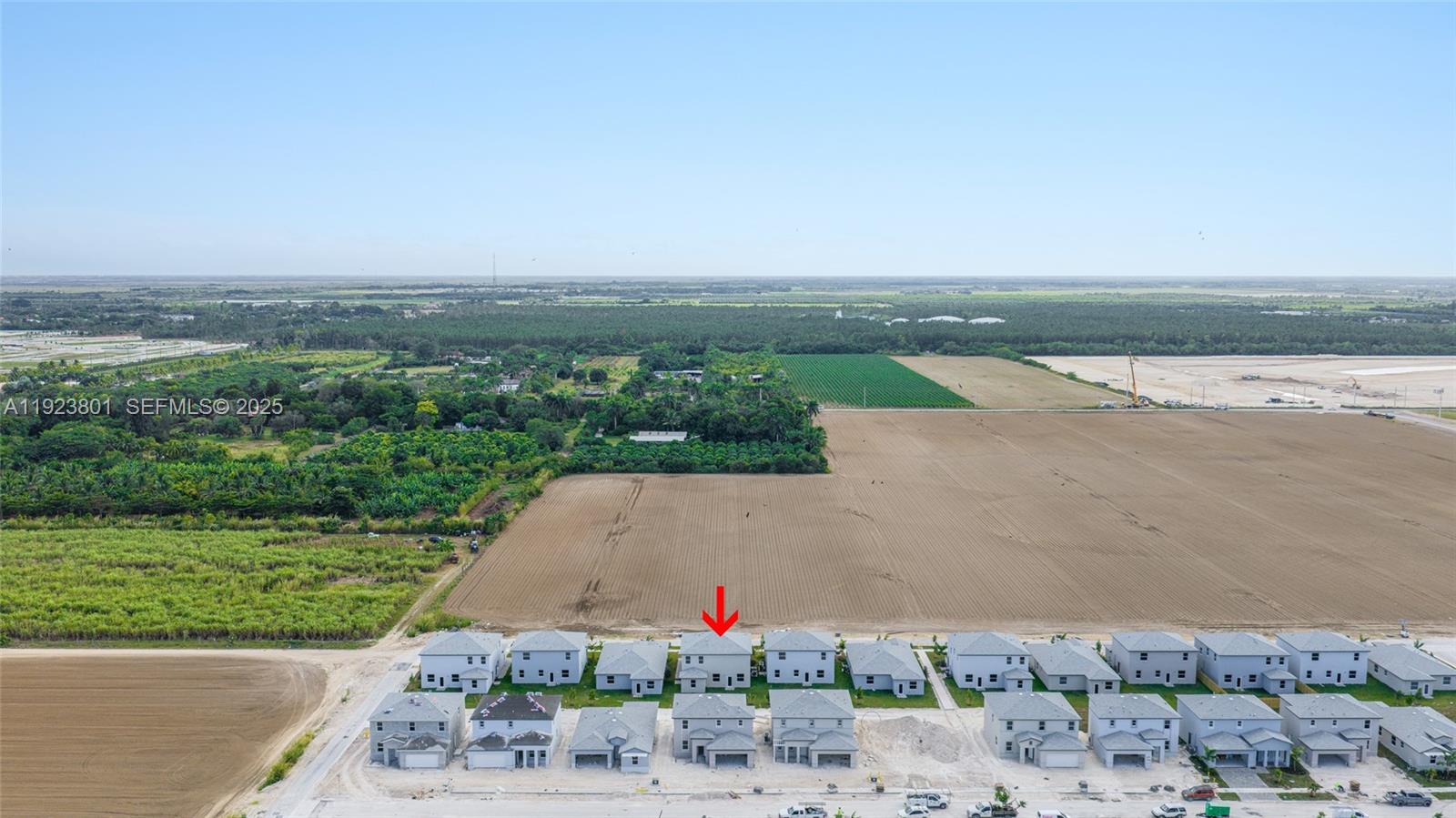 19431 Southwest 340th Street Homestead, FL 33034 - Photo 42 of 48 an aerial view of a house with a yard and lake view