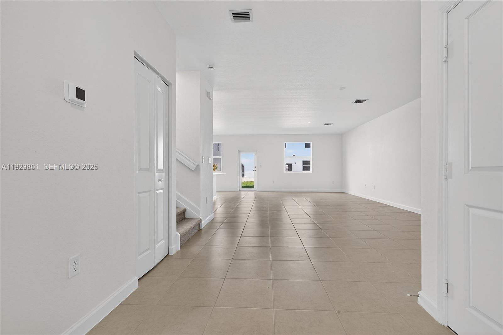 19431 Southwest 340th Street Homestead, FL 33034 - Photo 9 of 48 a view of an empty room