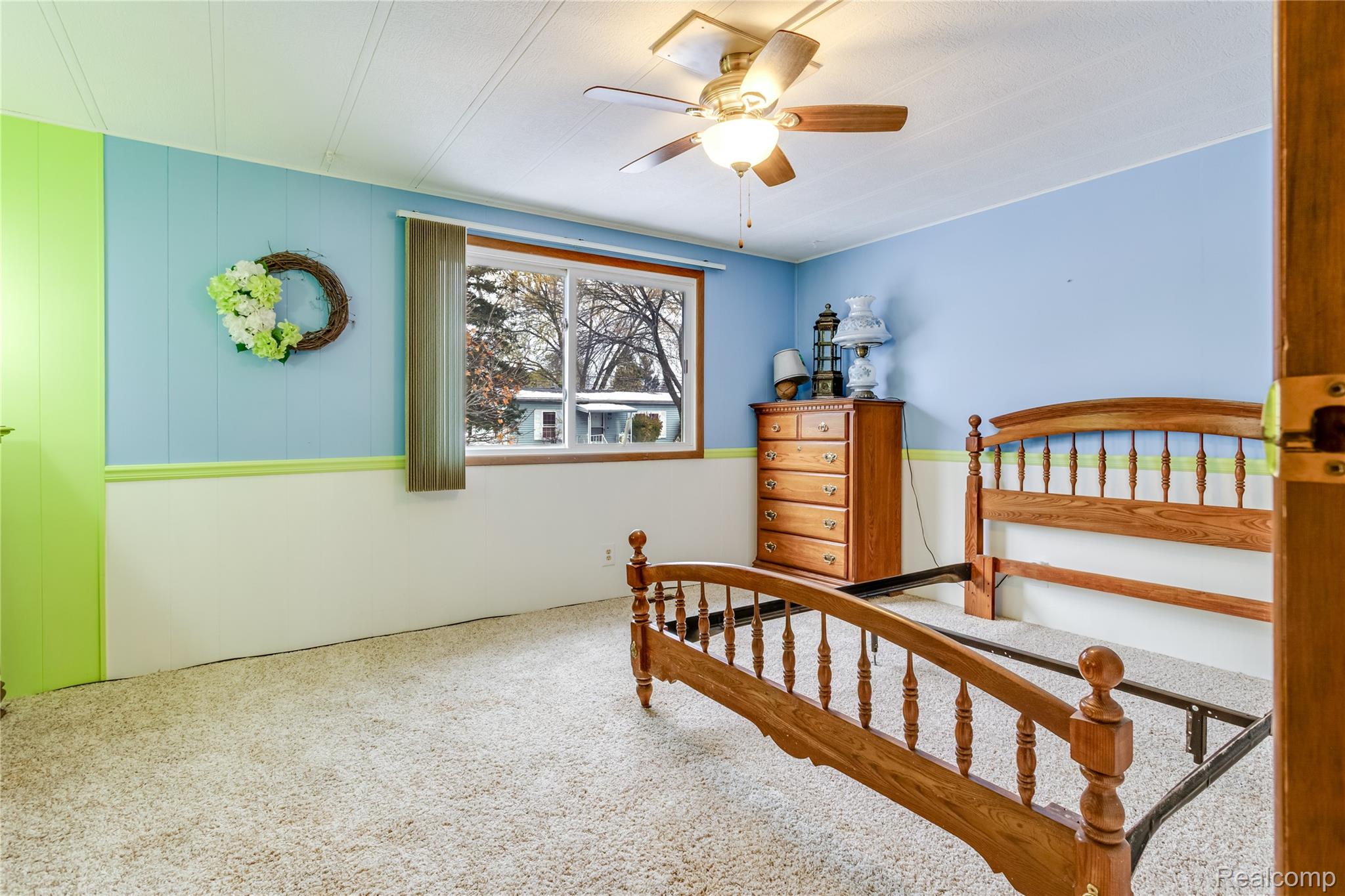 3333 Ravenswood Road Marysville, MI 48040 - Photo 15 of 25 Carpeted bedroom featuring a ceiling fan