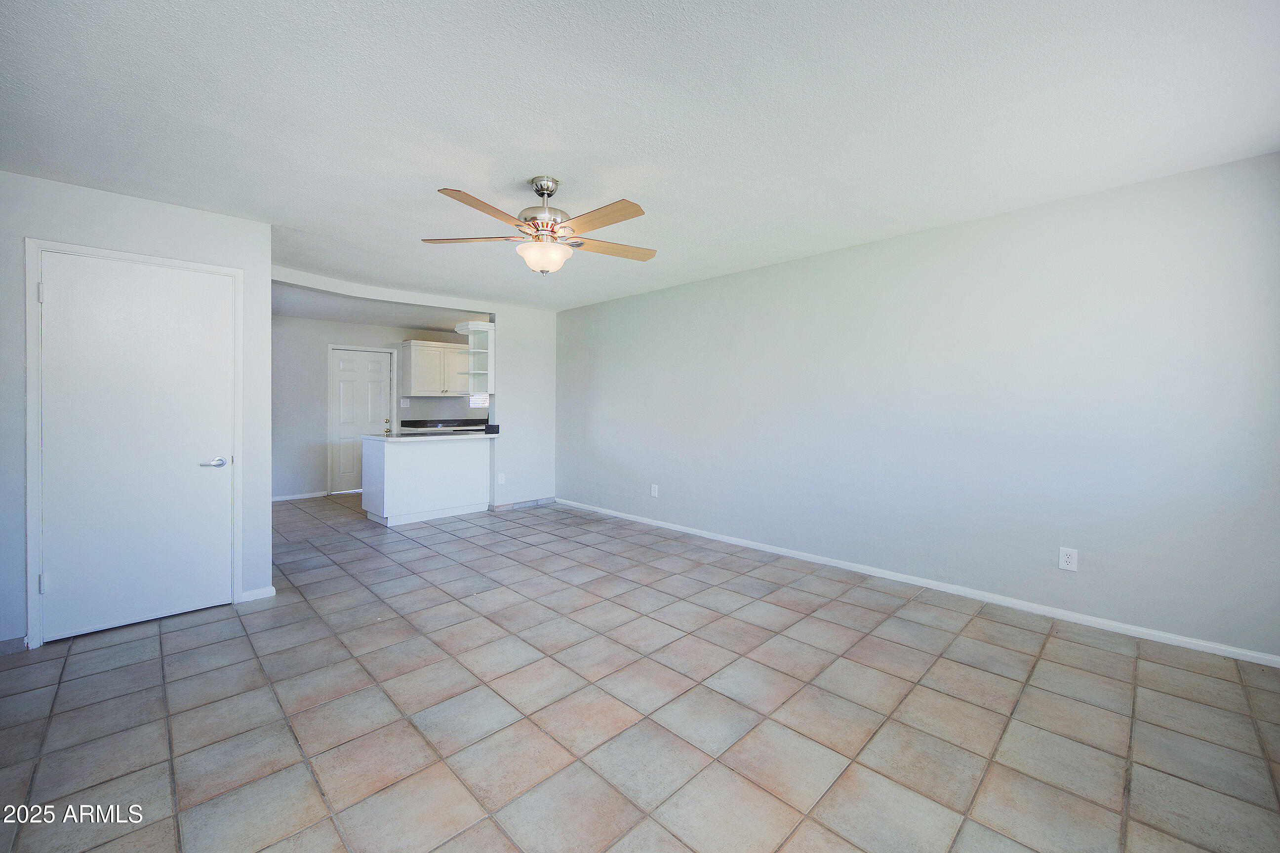 1206 West 9th Street Tempe, AZ 85281 - Photo 3 of 23 a view of a kitchen with a sink and a stove top oven