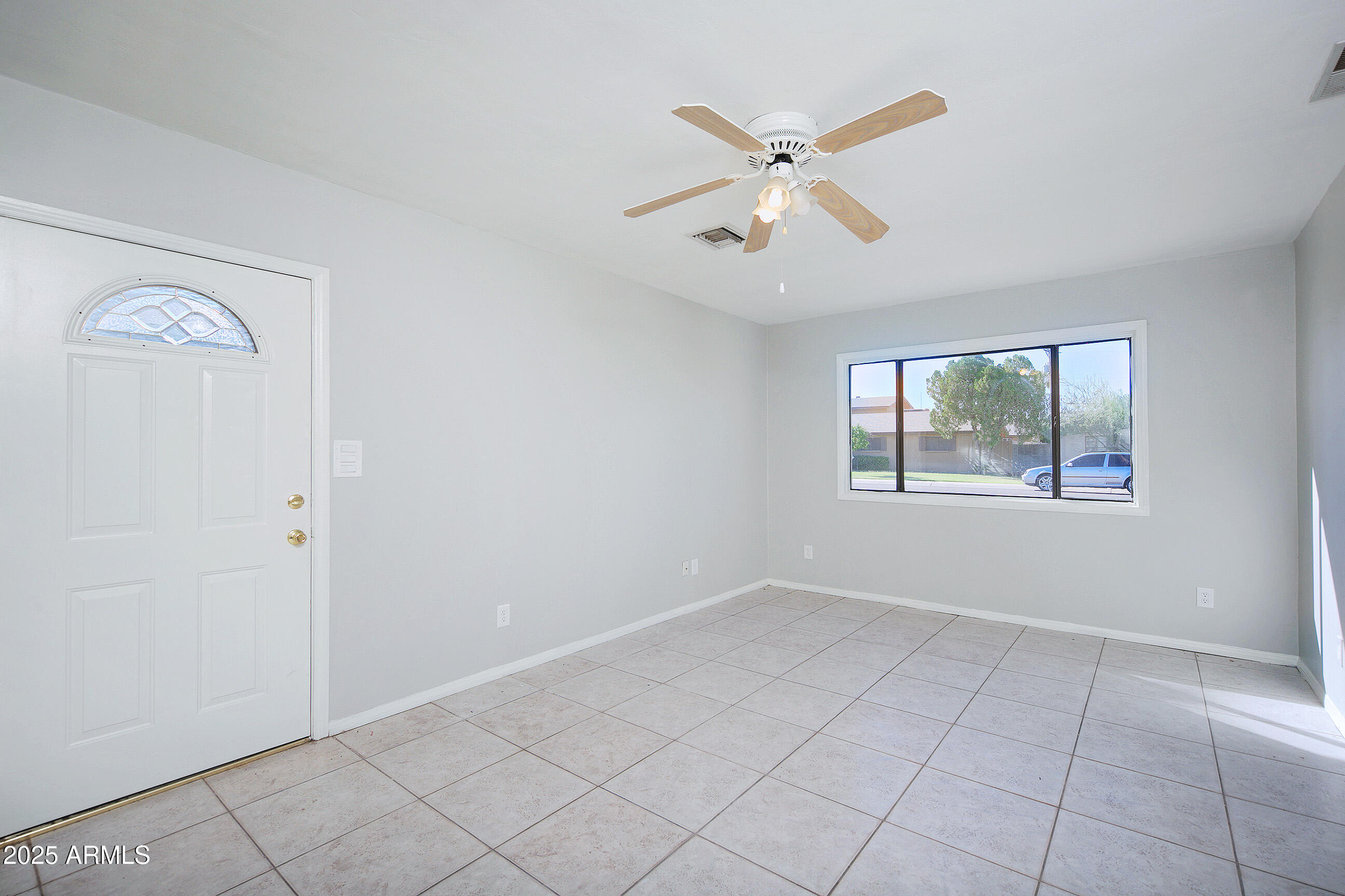 1206 West 9th Street Tempe, AZ 85281 - Photo 10 of 23 a view of an empty room with a window