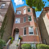 a front view of a multi story residential apartment building