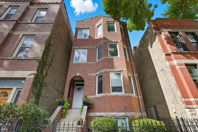 a front view of a multi story residential apartment building