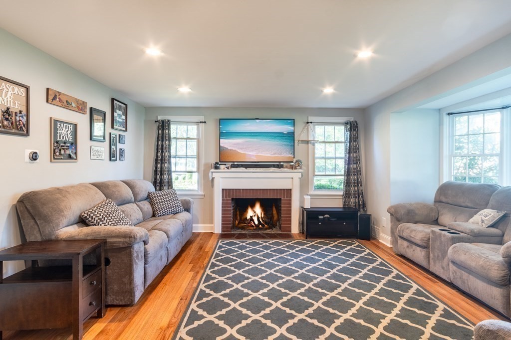 55 Lyman Street West Springfield, MA 01089 - Photo 11 of 24 a living room with furniture and a fireplace