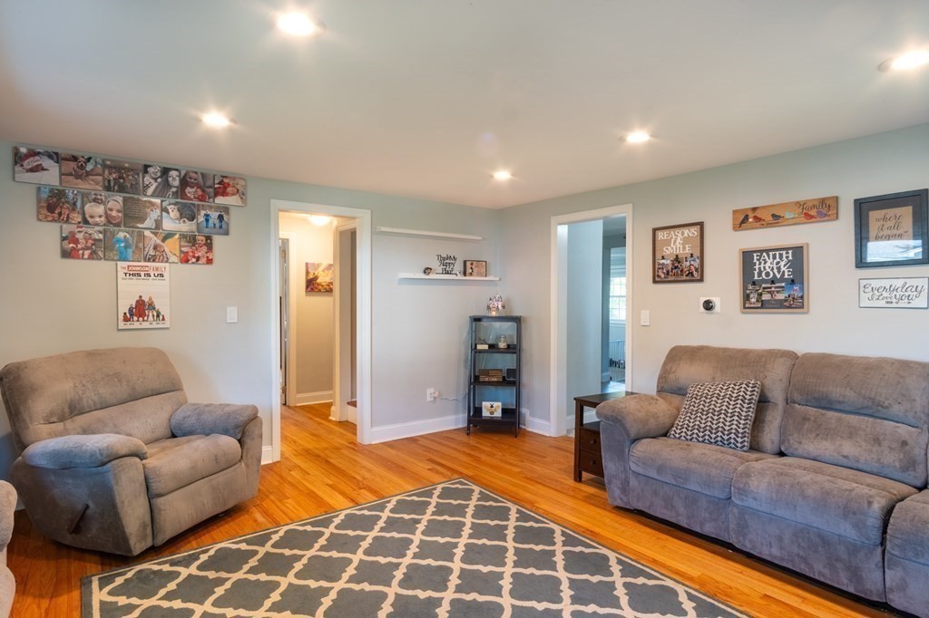 55 Lyman Street West Springfield, MA 01089 - Photo 13 of 24 a living room with furniture and a couch