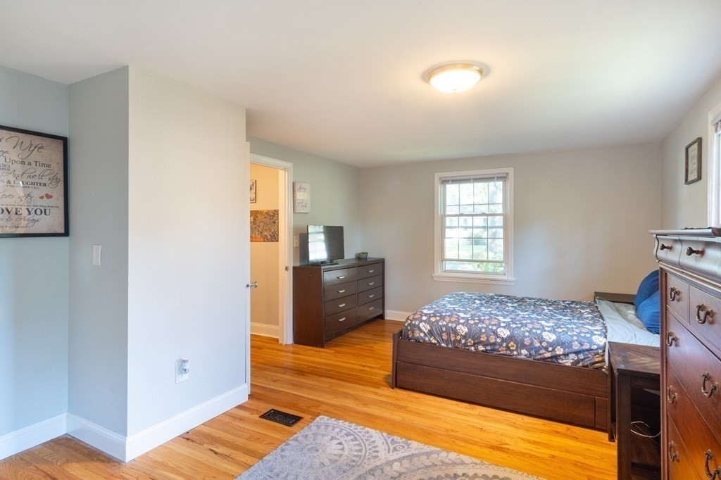 55 Lyman Street West Springfield, MA 01089 - Photo 15 of 24 a bedroom with a bed and a window