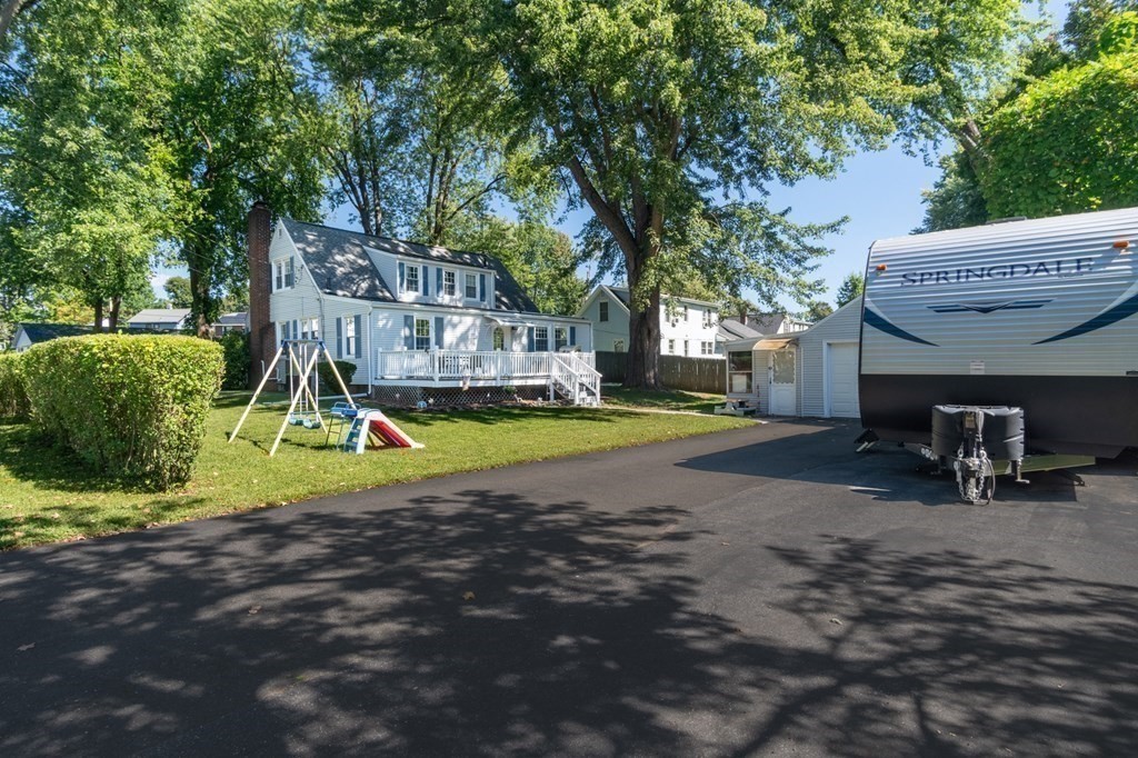 55 Lyman Street West Springfield, MA 01089 - Photo 24 of 24 a view of yard with swimming pool and seating space