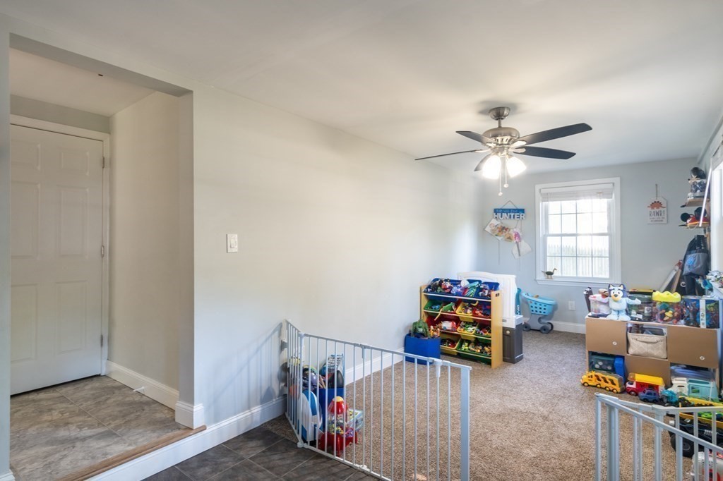 55 Lyman Street West Springfield, MA 01089 - Photo 5 of 24 a children room with furniture and a window
