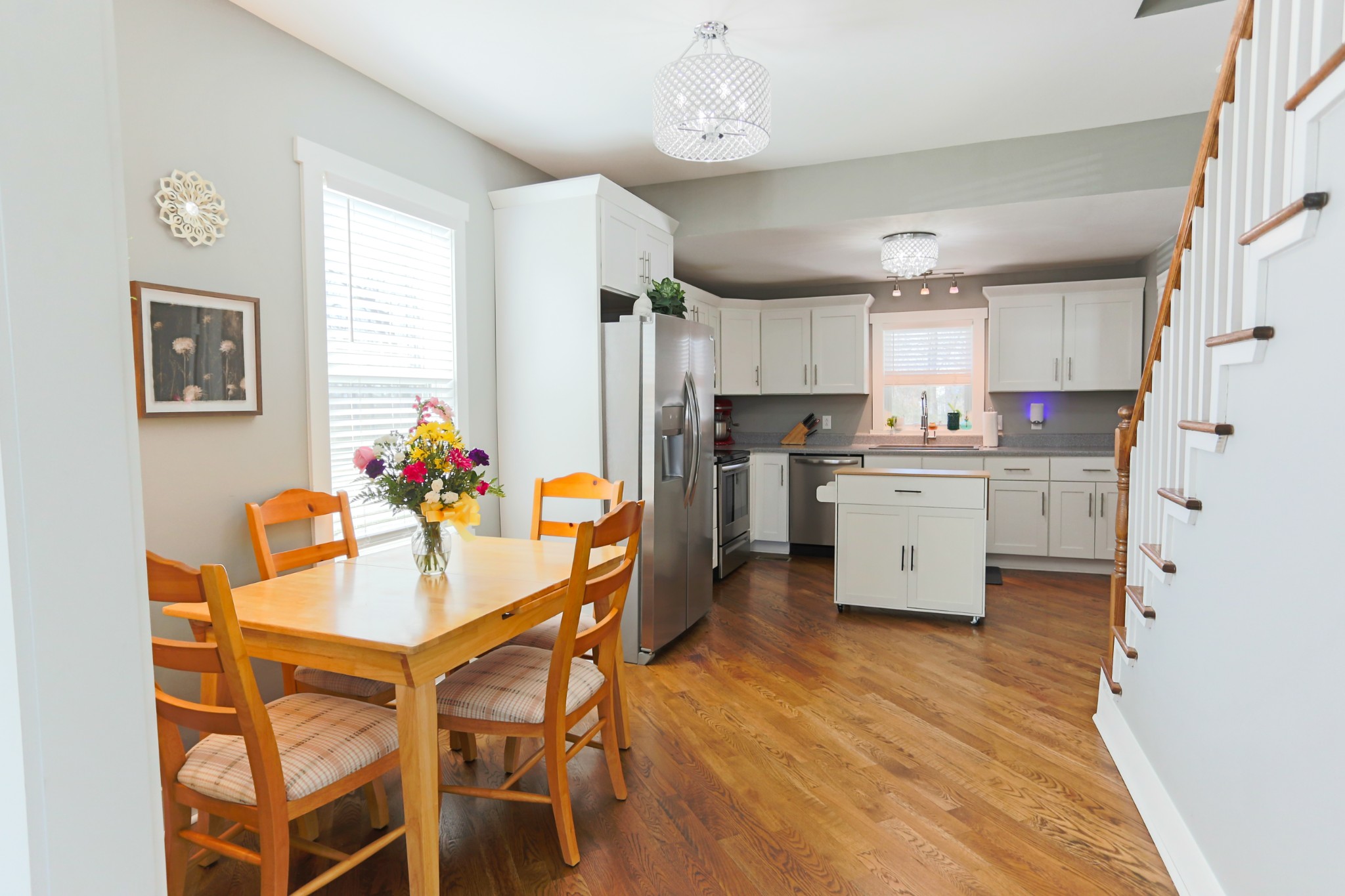 5288 Fred Perry Road Springfield, TN 37172 - Photo 15 of 36 a kitchen with stainless steel appliances a dining table chairs refrigerator and sink