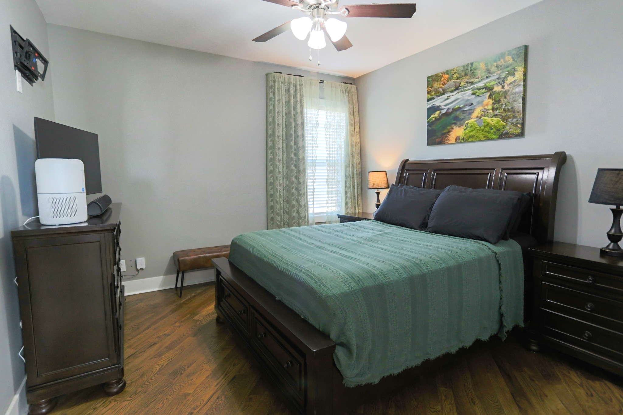 5288 Fred Perry Road Springfield, TN 37172 - Photo 23 of 36 a bedroom with a bed and wooden floor
