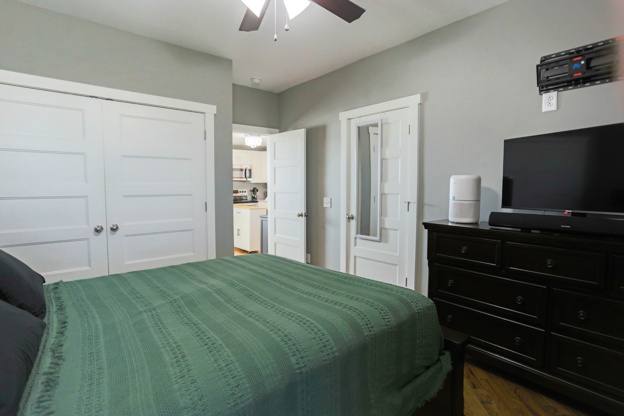 5288 Fred Perry Road Springfield, TN 37172 - Photo 24 of 36 a bedroom with a bed and a flat tv screen on dresser