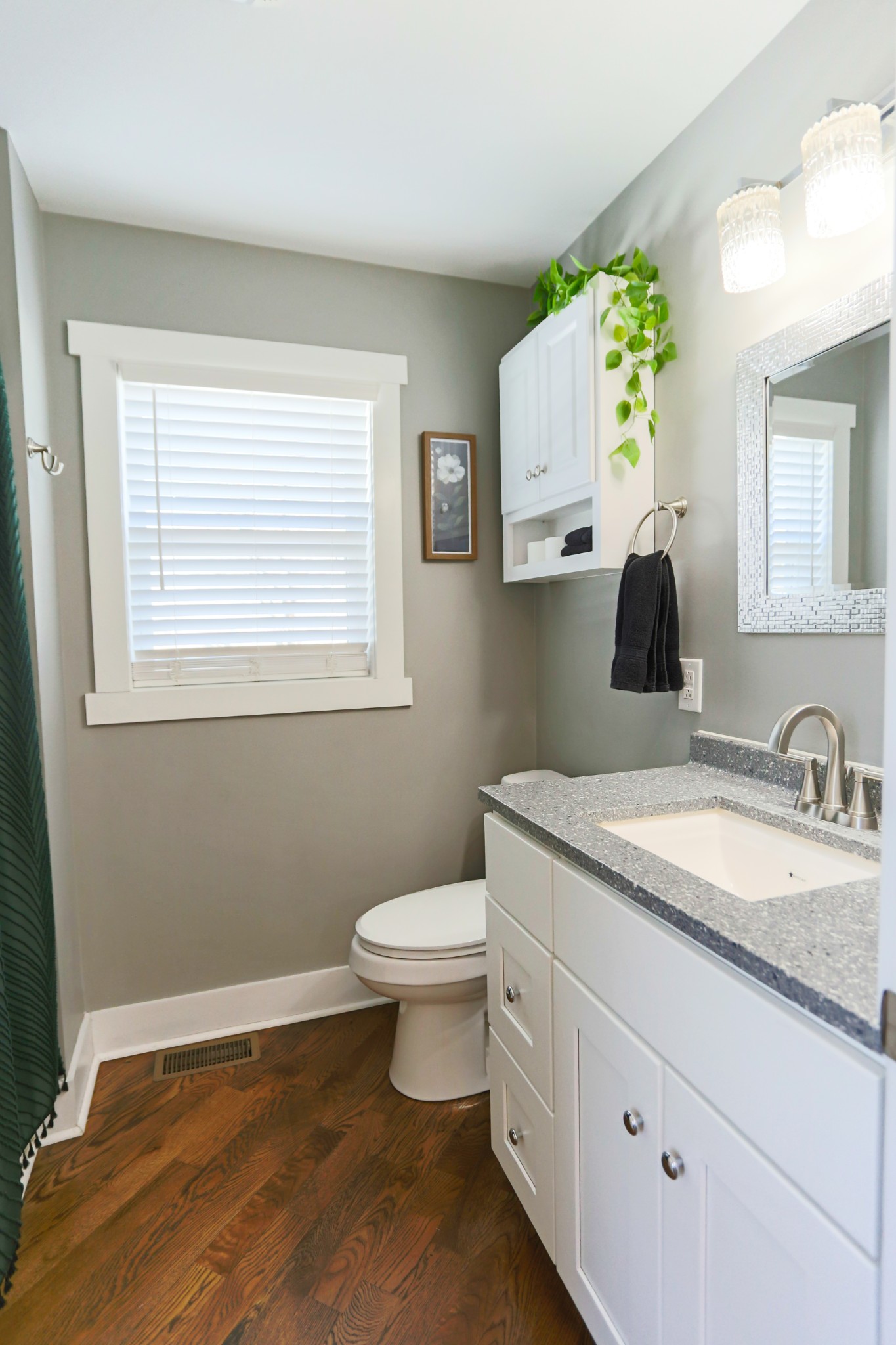 5288 Fred Perry Road Springfield, TN 37172 - Photo 25 of 36 a bathroom with a granite countertop toilet a sink and mirror