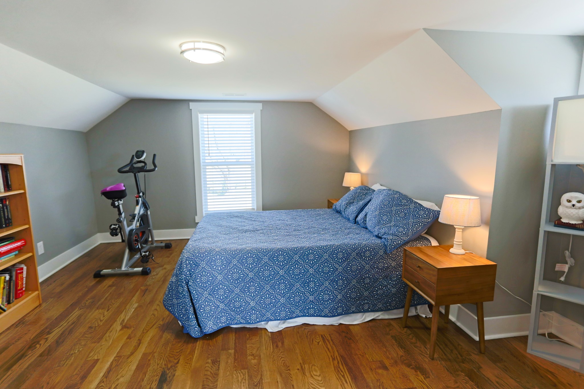 5288 Fred Perry Road Springfield, TN 37172 - Photo 29 of 36 a bedroom with a bed and wooden floor