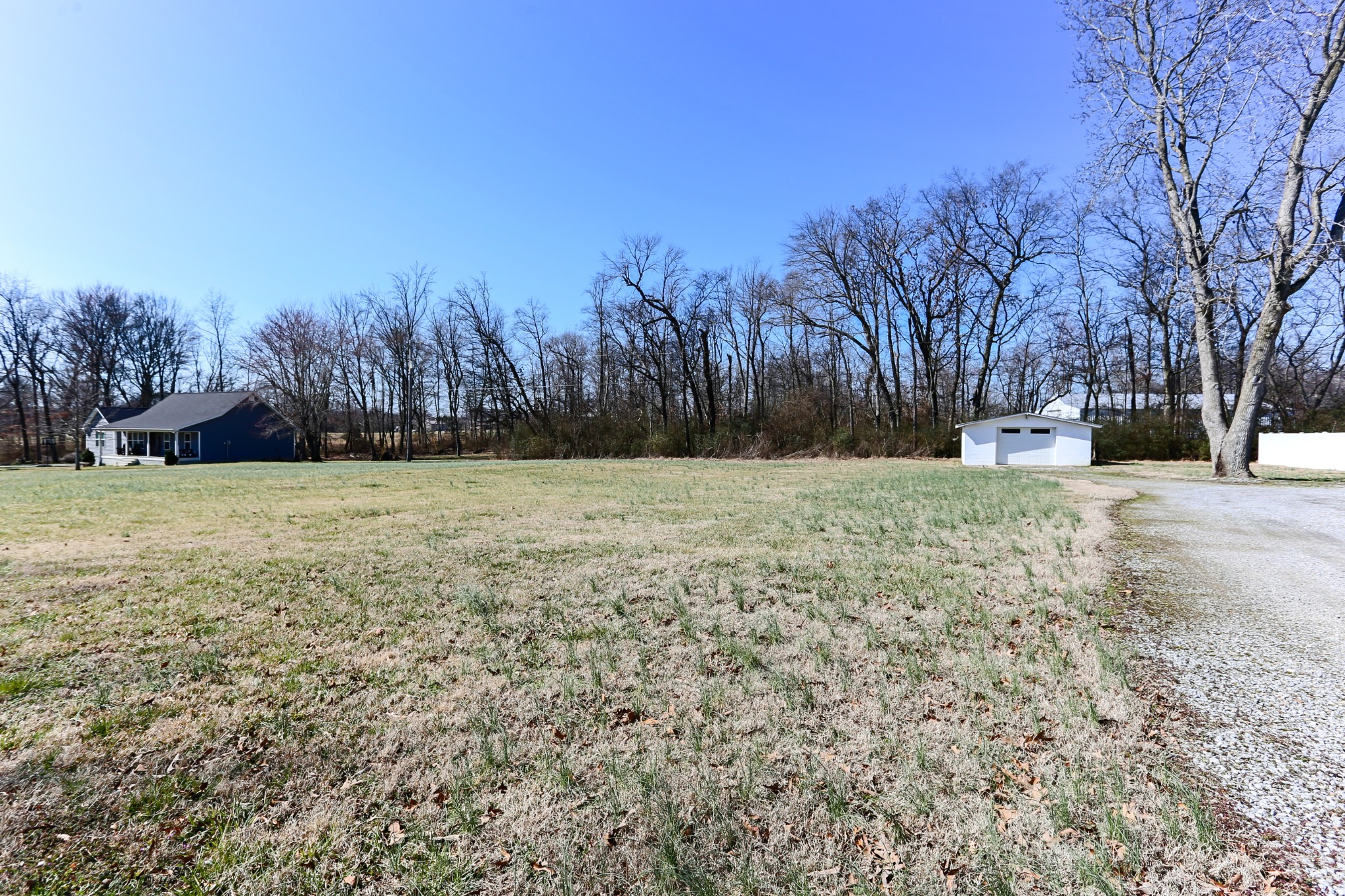 5288 Fred Perry Road Springfield, TN 37172 - Photo 6 of 36 a view of a yard with a house in the background