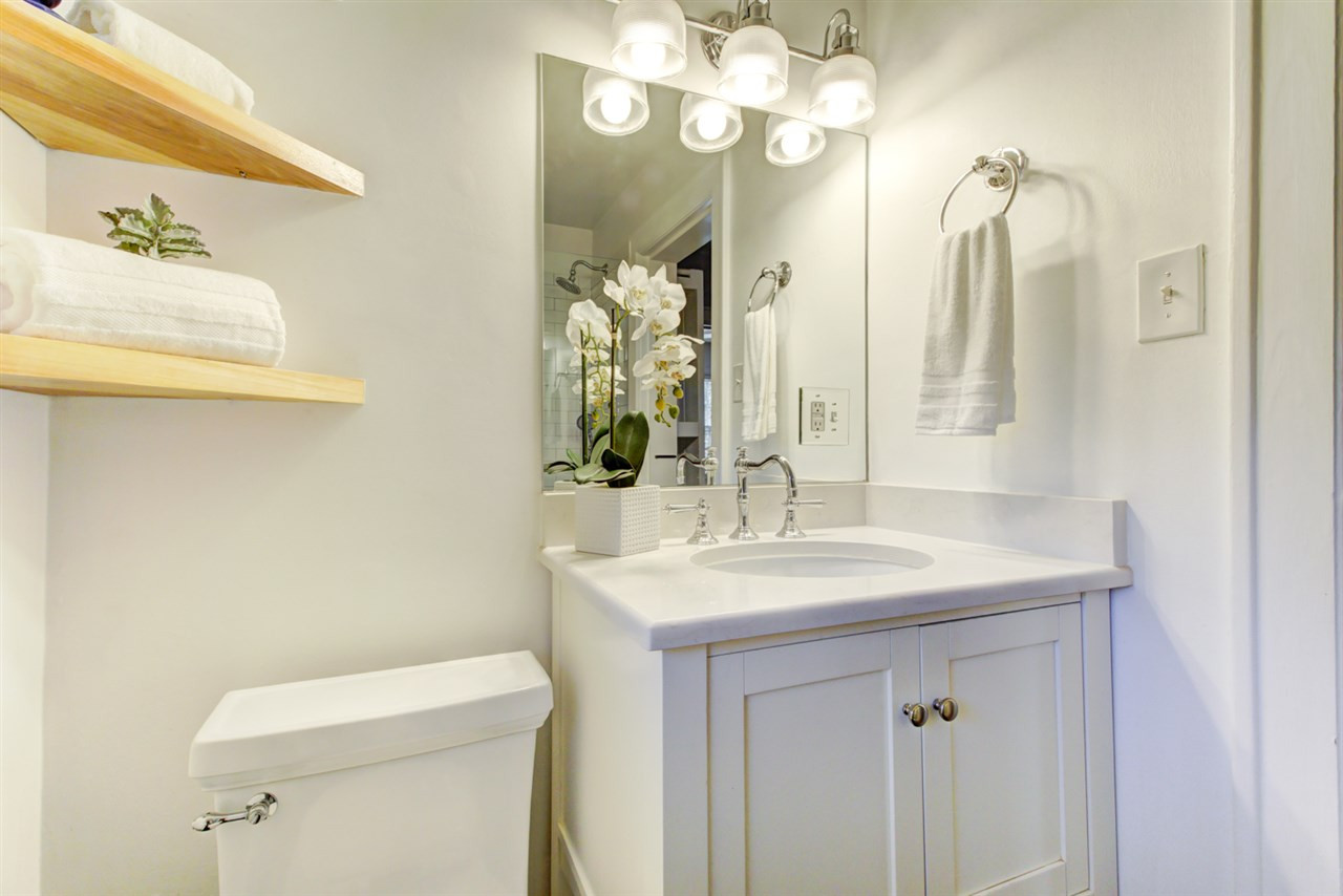 413 Dixie Trail Raleigh, NC 27607 - Photo 20 of 30 Spa like feel in lovely updated hall full bathroom Bathroom