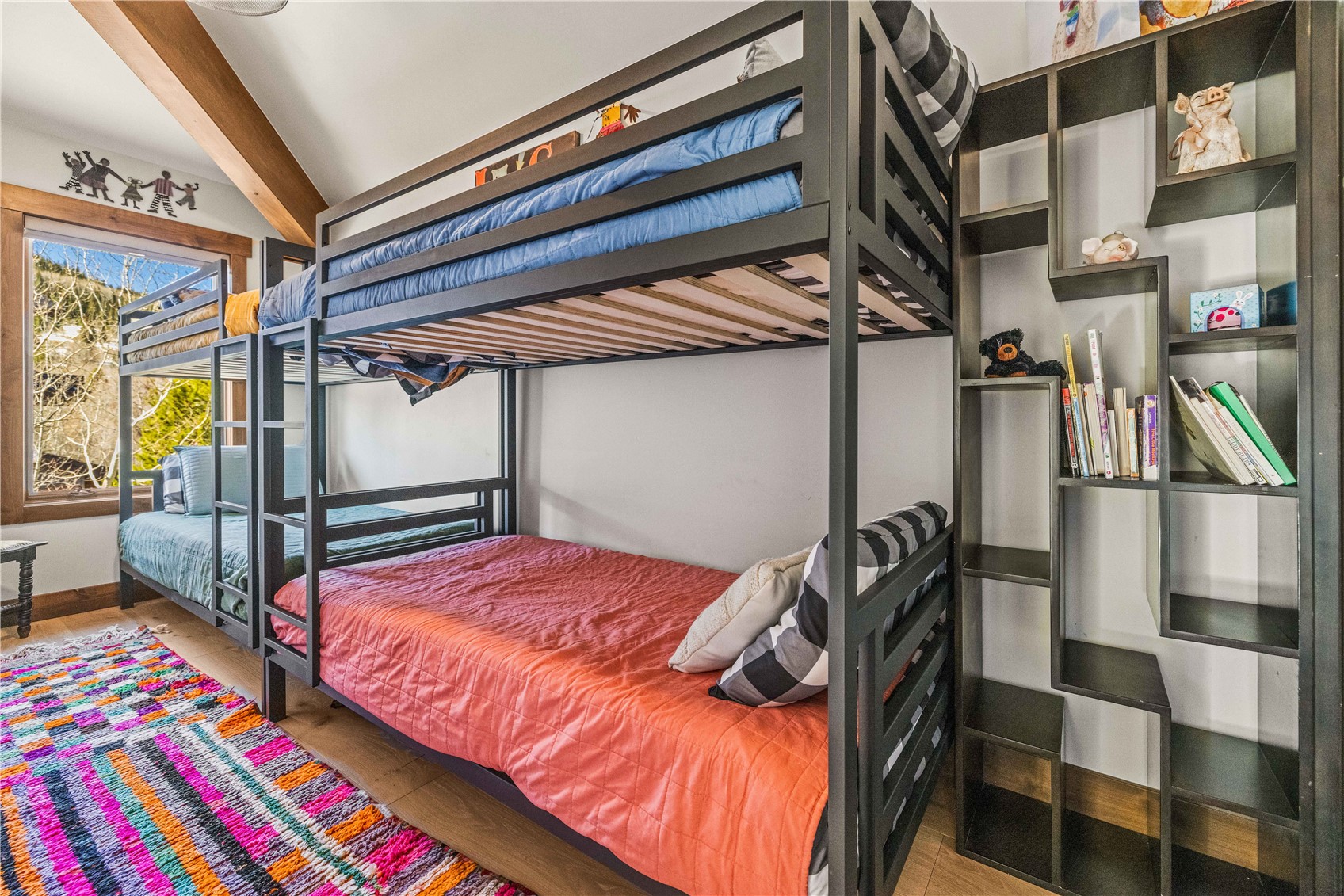 230 Game Trail Road Silverthorne, CO 80498 - Photo 41 of 43 a bedroom with a bed and a walk in closet