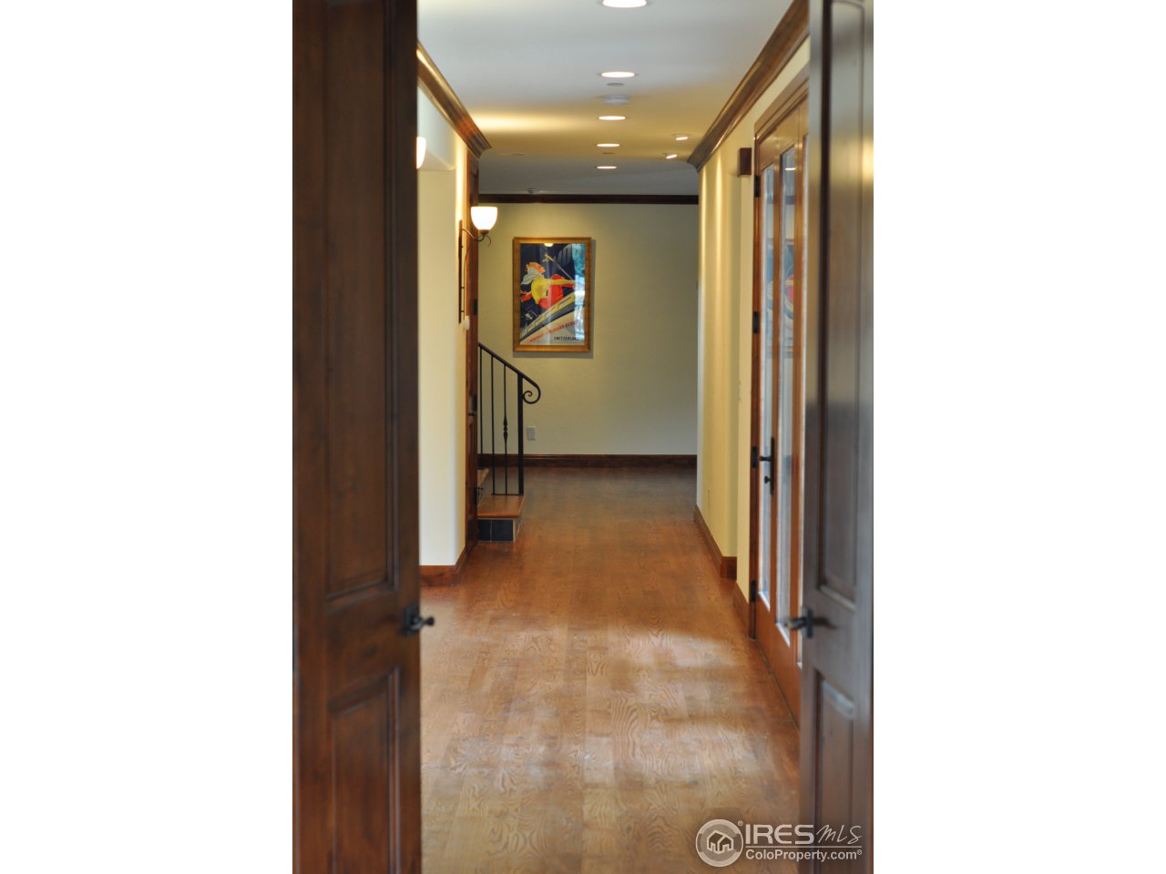 1710 Hillside Road Boulder, CO 80302 - Photo 9 of 20 a view of a hallway with wooden floor