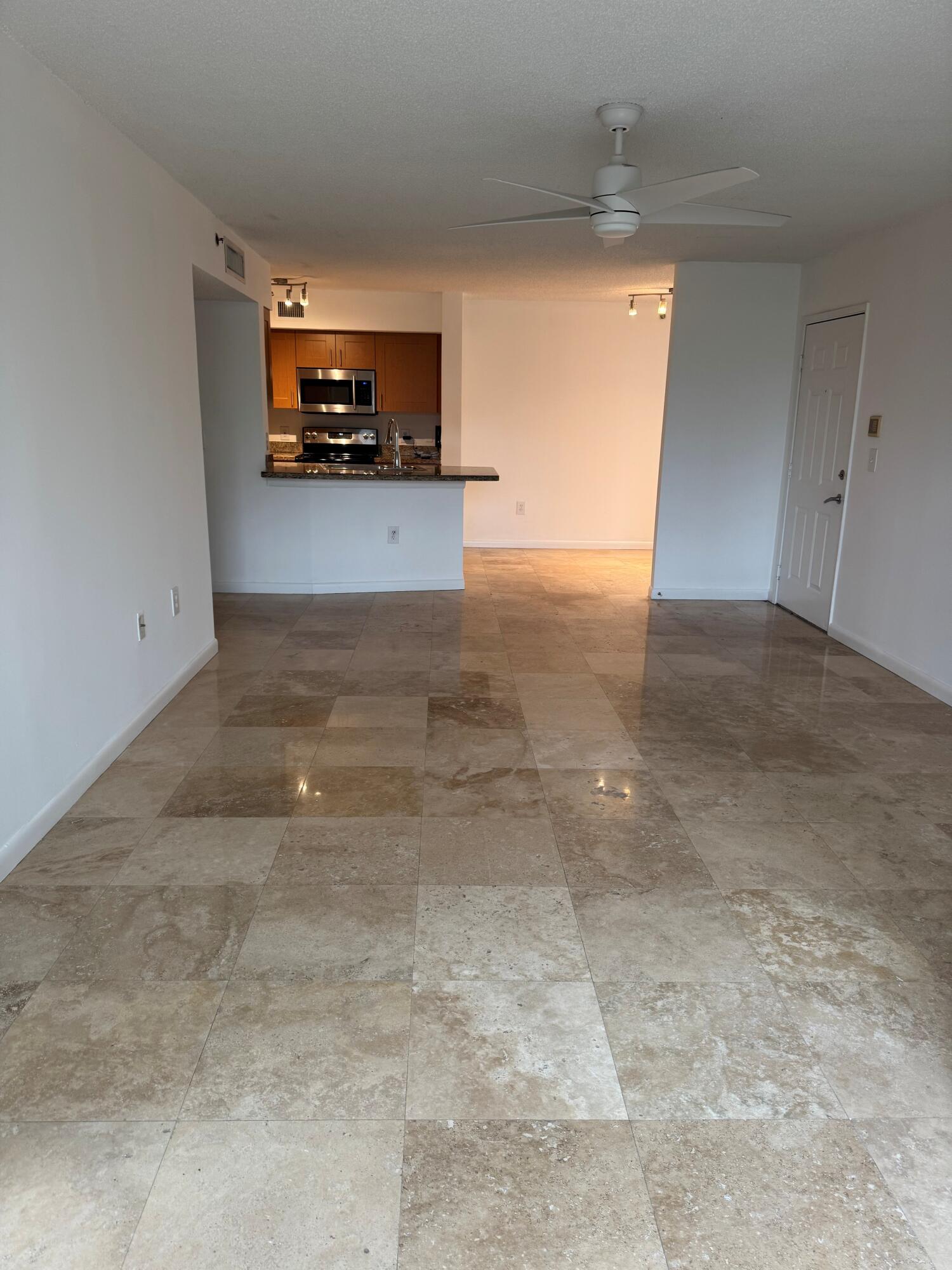 3111 Clint Moore Road, Unit 102 Boca Raton, FL 33496 - Photo 2 of 9 bocar great room 2