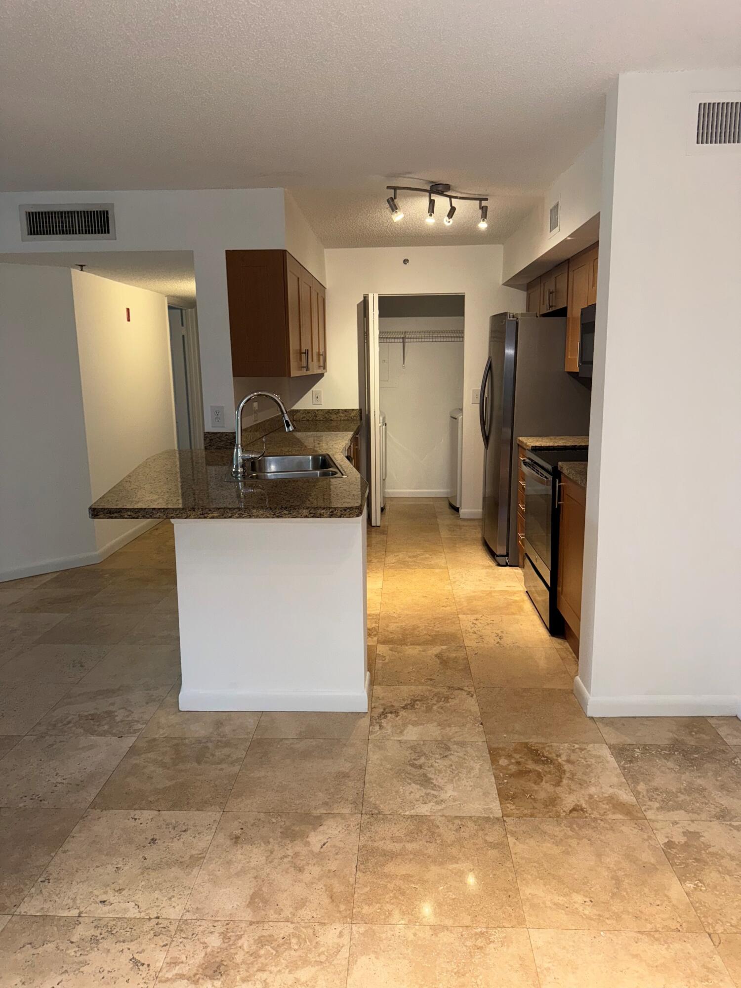 3111 Clint Moore Road, Unit 102 Boca Raton, FL 33496 - Photo 6 of 9 boca kitchen 1