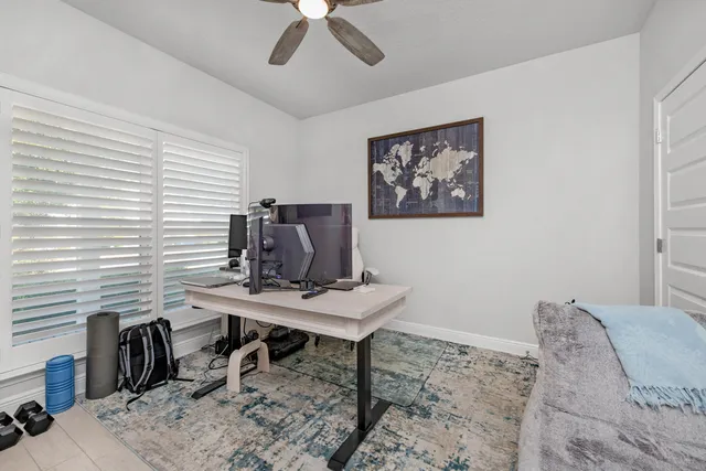 a view of a workspace with furniture
