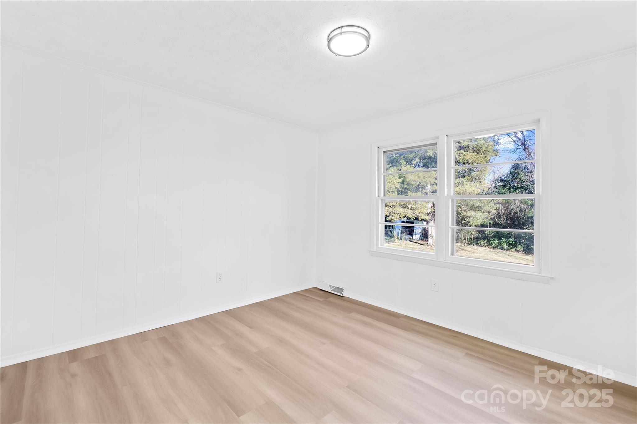 2405 Florida Avenue Kannapolis, NC 28083 - Photo 9 of 38 an empty room with a window
