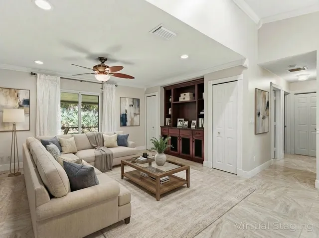 a dining room with furniture window and outside view
