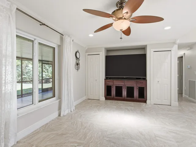 a kitchen with stainless steel appliances granite countertop a refrigerator stove top oven and sink