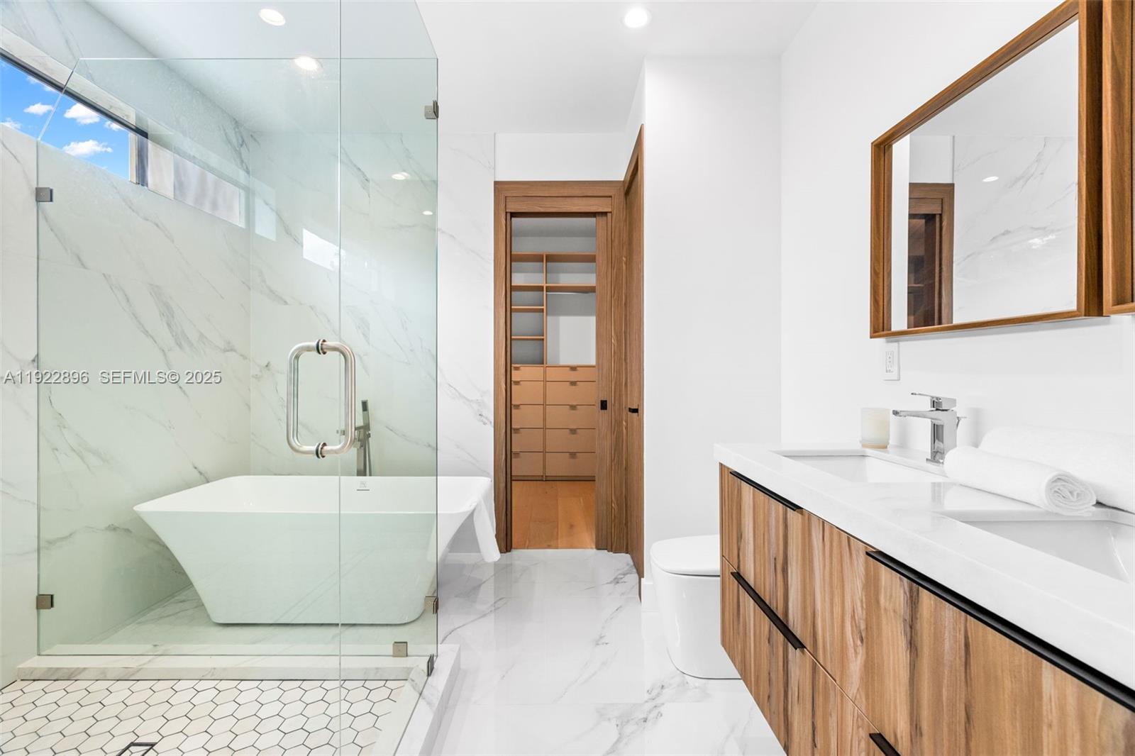 66 Northwest 50th Street Miami, FL 33127 - Photo 37 of 60 a bathroom with a sink and a bathtub