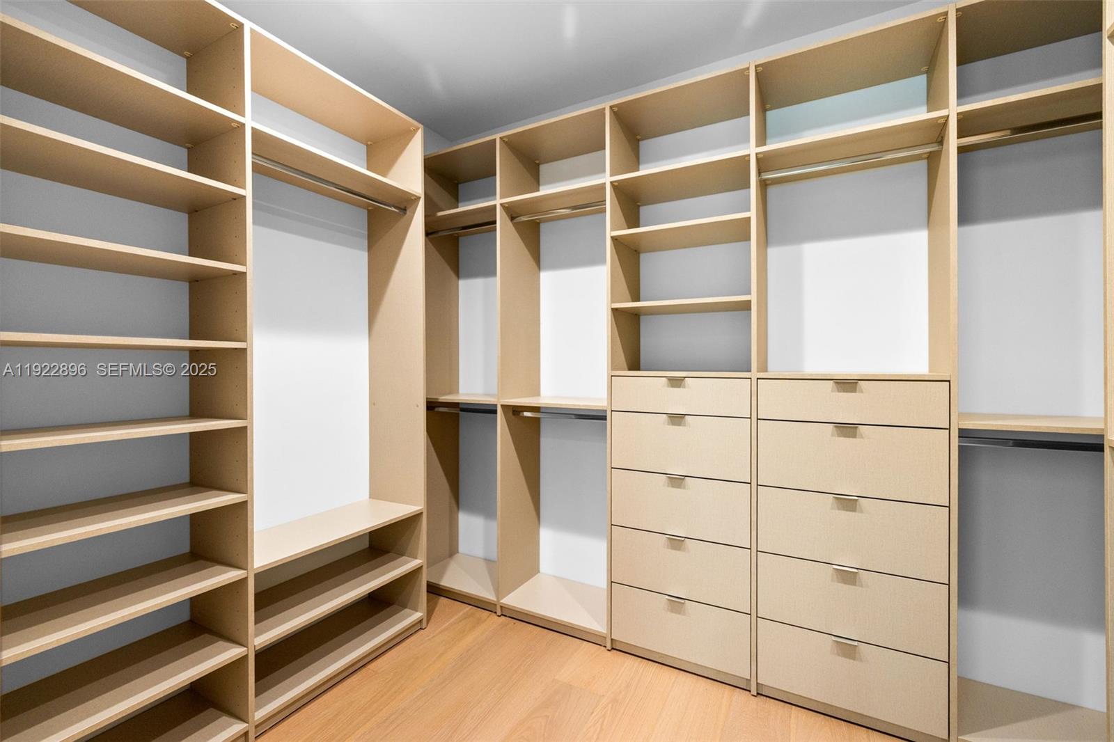 66 Northwest 50th Street Miami, FL 33127 - Photo 40 of 60 a view of walk in closet with empty racks