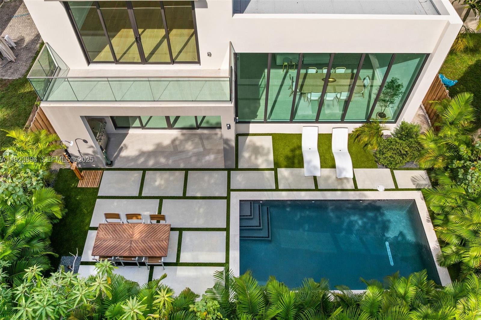 66 Northwest 50th Street Miami, FL 33127 - Photo 51 of 60 a view of a small yard from a balcony