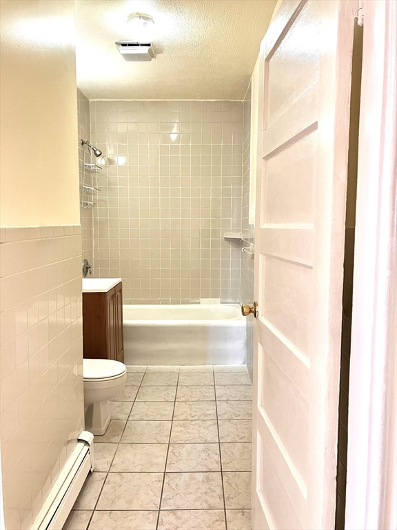 41 Brimblecom Street, Unit 3 Lynn, MA 01902 - Photo 16 of 16 a bathroom with a bathtub and a shower