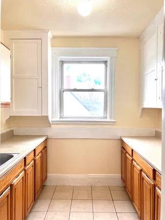 a view of a kitchen with a sink