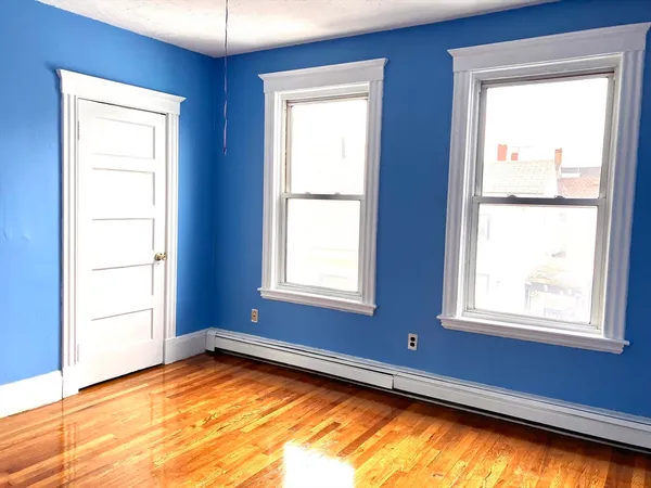 a view of an empty room and window