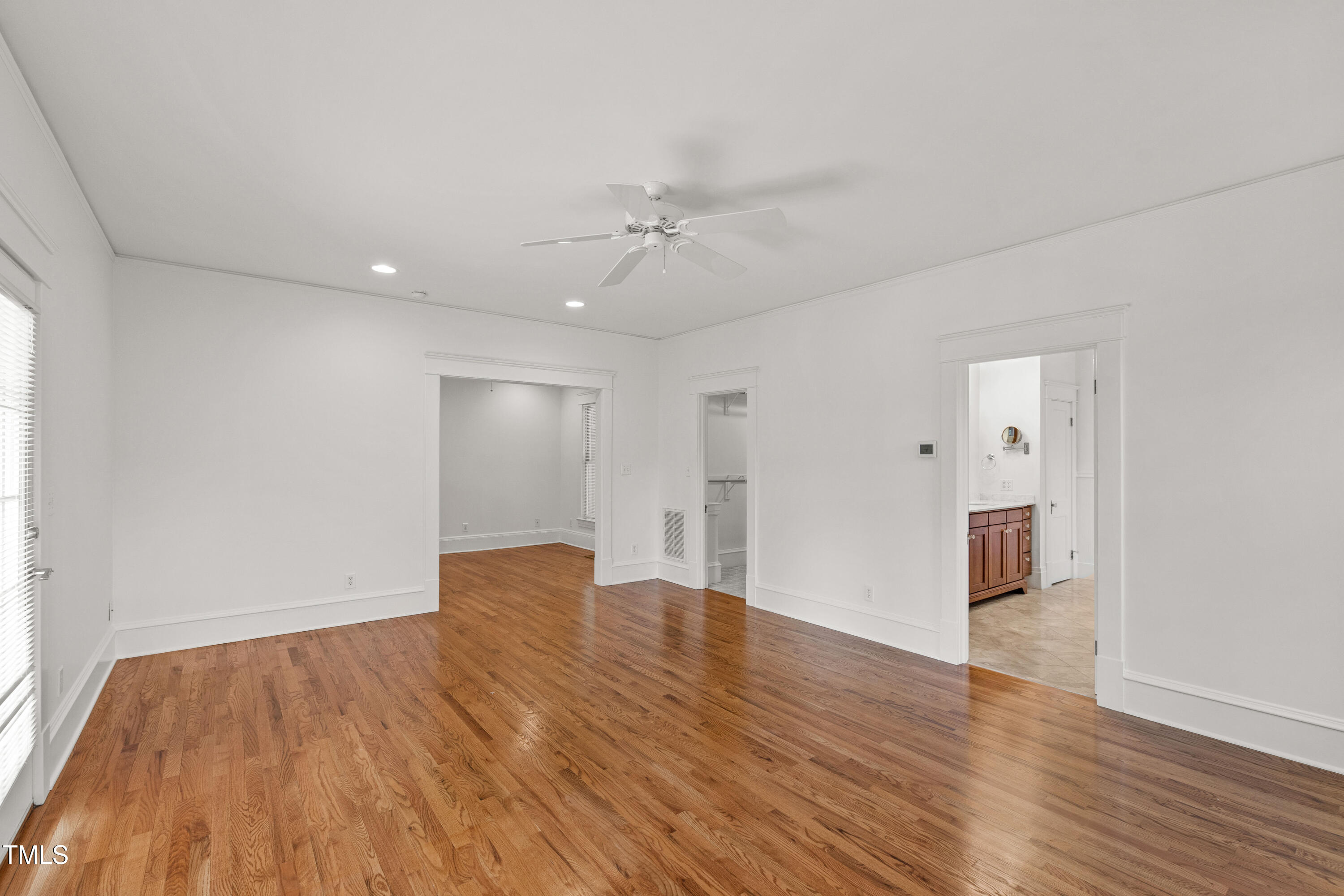 2202 St Marys Street Raleigh, NC 27608 - Photo 25 of 63 wooden floor in an empty room with a window