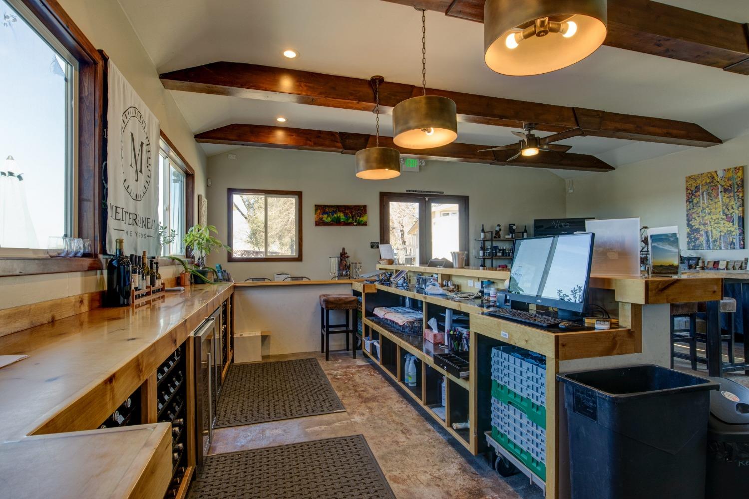 Undisclosed Address Somerset, CA 95684 - Photo 12 of 90 a kitchen with lots of counter space and breakfast area
