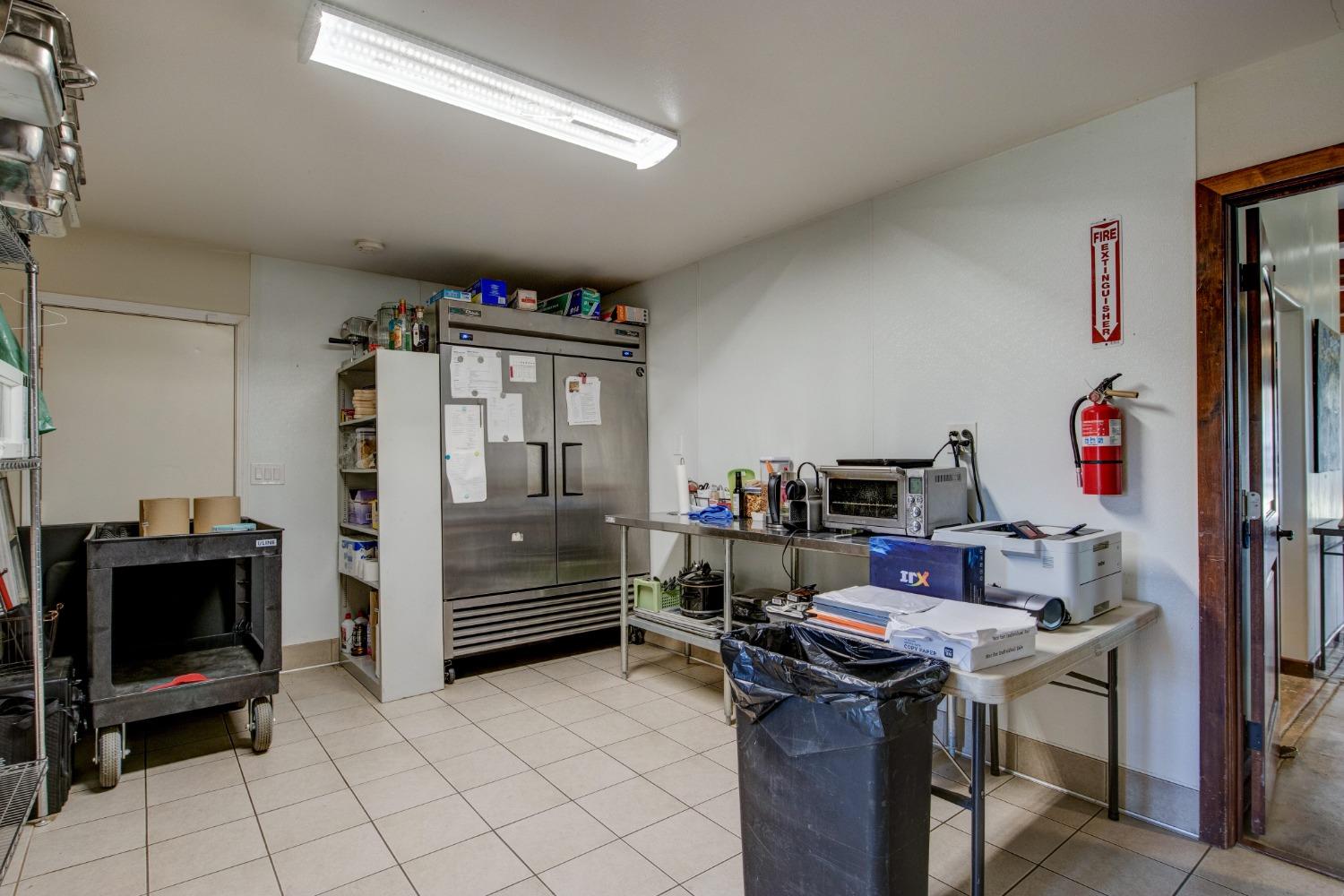 Undisclosed Address Somerset, CA 95684 - Photo 17 of 90 a view of a workspace with furniture